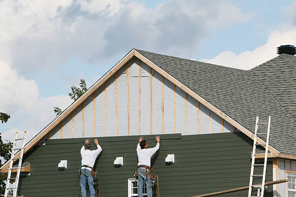 Professional Siding Replacement technician working in Milford, IN